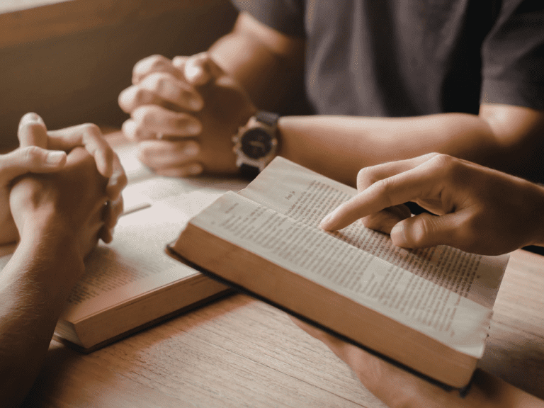 people praying and reading the bible