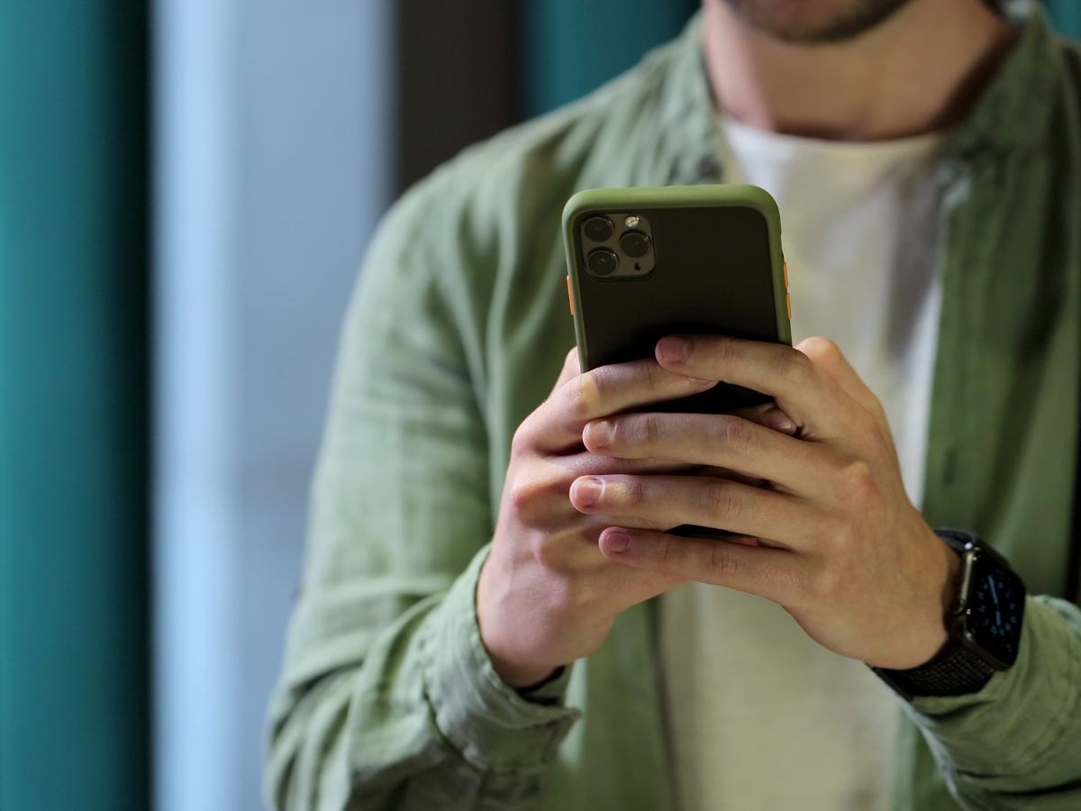 boy scrolling on his phone