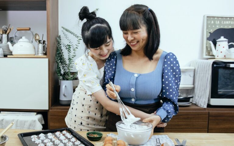 mom daughter cooking
